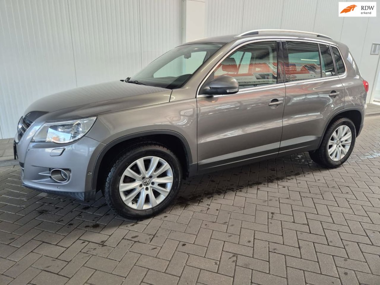 Volkswagen Tiguan - 2.0 TSI Sport&Style-4x4-automaat-leder - AutoWereld.nl