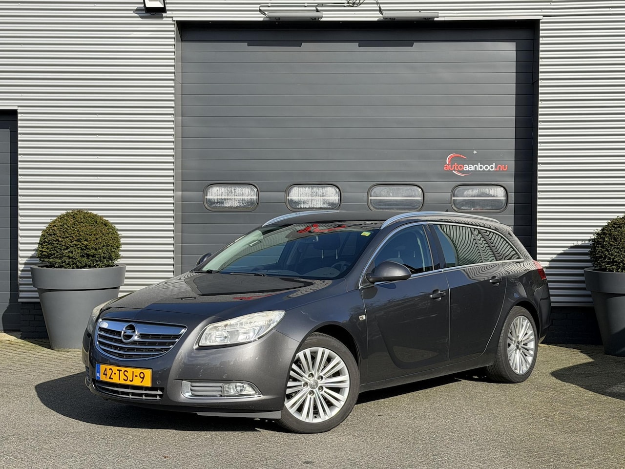 Opel Insignia Sports Tourer - 1.4 Turbo EcoFLEX Business Edition | Navigatie | Parkeersensoren | Lichtmetalen Velgen | - AutoWereld.nl