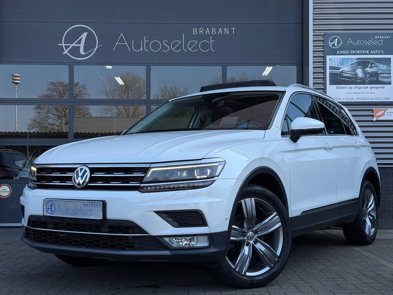 Volkswagen Tiguan - 1.4 TSI 4Motion Highline Pano HUD LED - AutoWereld.nl