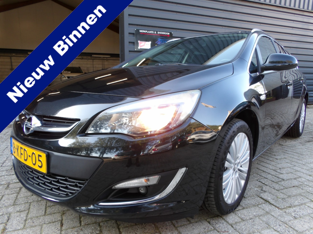 Opel Astra Sports Tourer - 1.4 Turbo Design Edition Trekhaak Clima Cruise Control - AutoWereld.nl