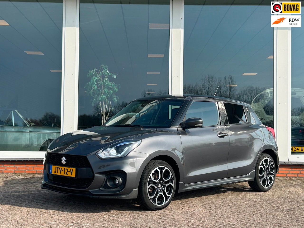 Suzuki Swift - 1.4 Sport Smart Hybrid - Navi - Camera - 17 inch - AutoWereld.nl