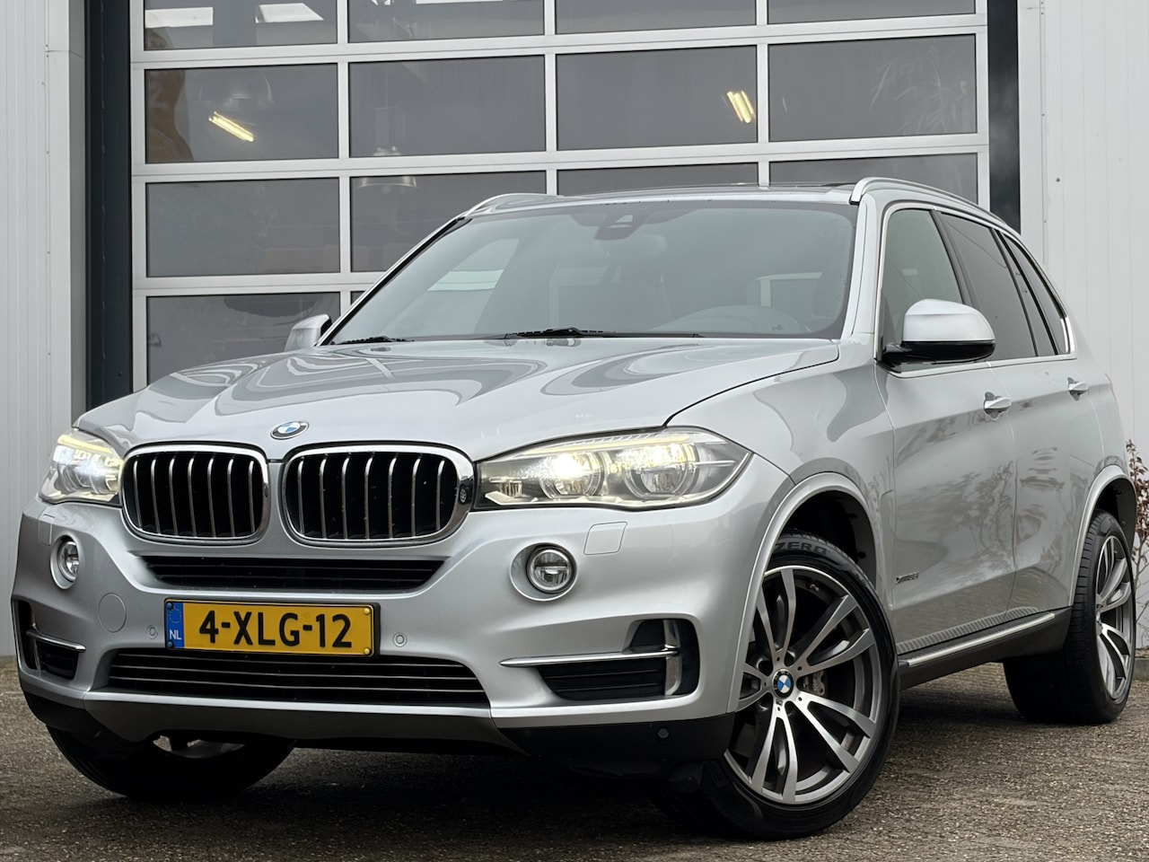 BMW X5 - xDrive35i High Executive 306pk | 7-persoons | Elektrisch glazen panorama-dak | LED koplamp - AutoWereld.nl