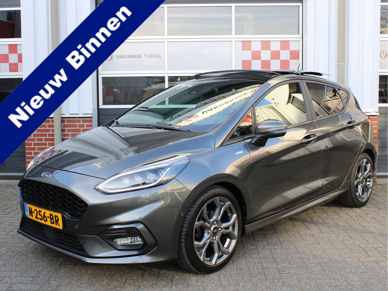 Ford Fiesta - 1.0 EcoBoost Hybrid 125 pk ST-Line X AUTOMAAT/PANORAMADAK/B&O/Winterpack/Climate/Navi/Half - AutoWereld.nl