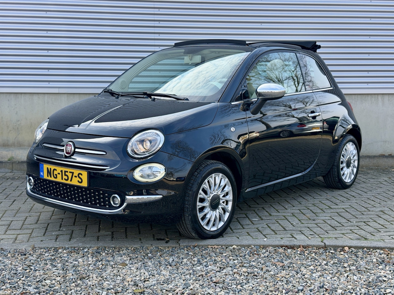 Fiat 500 C - Cabrio 1.2 Lounge [ fm navi,airco,audio,lmv,pdc ] - AutoWereld.nl