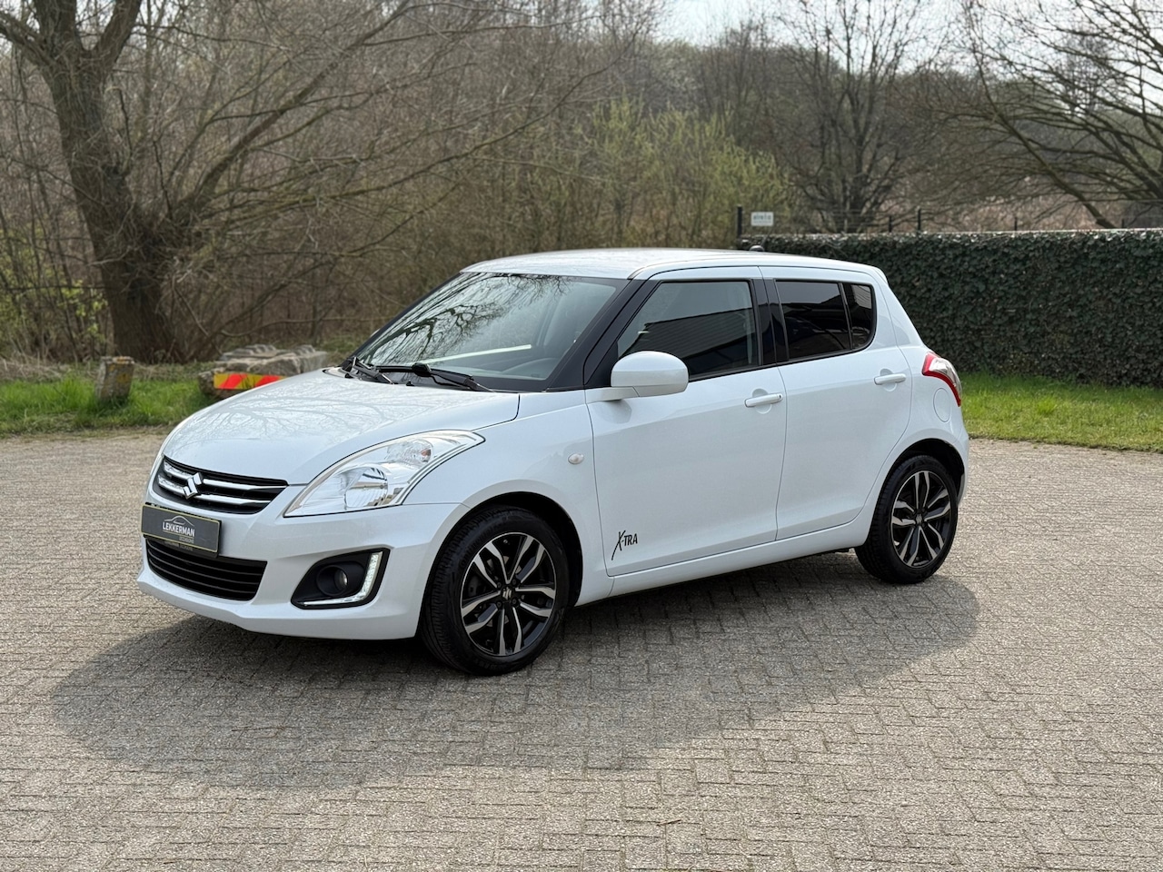 Suzuki Swift - 1.2 Exclusive EASSS XTRA I CRUISE I STOELVERW I GOED ONDERHOUDEN - AutoWereld.nl