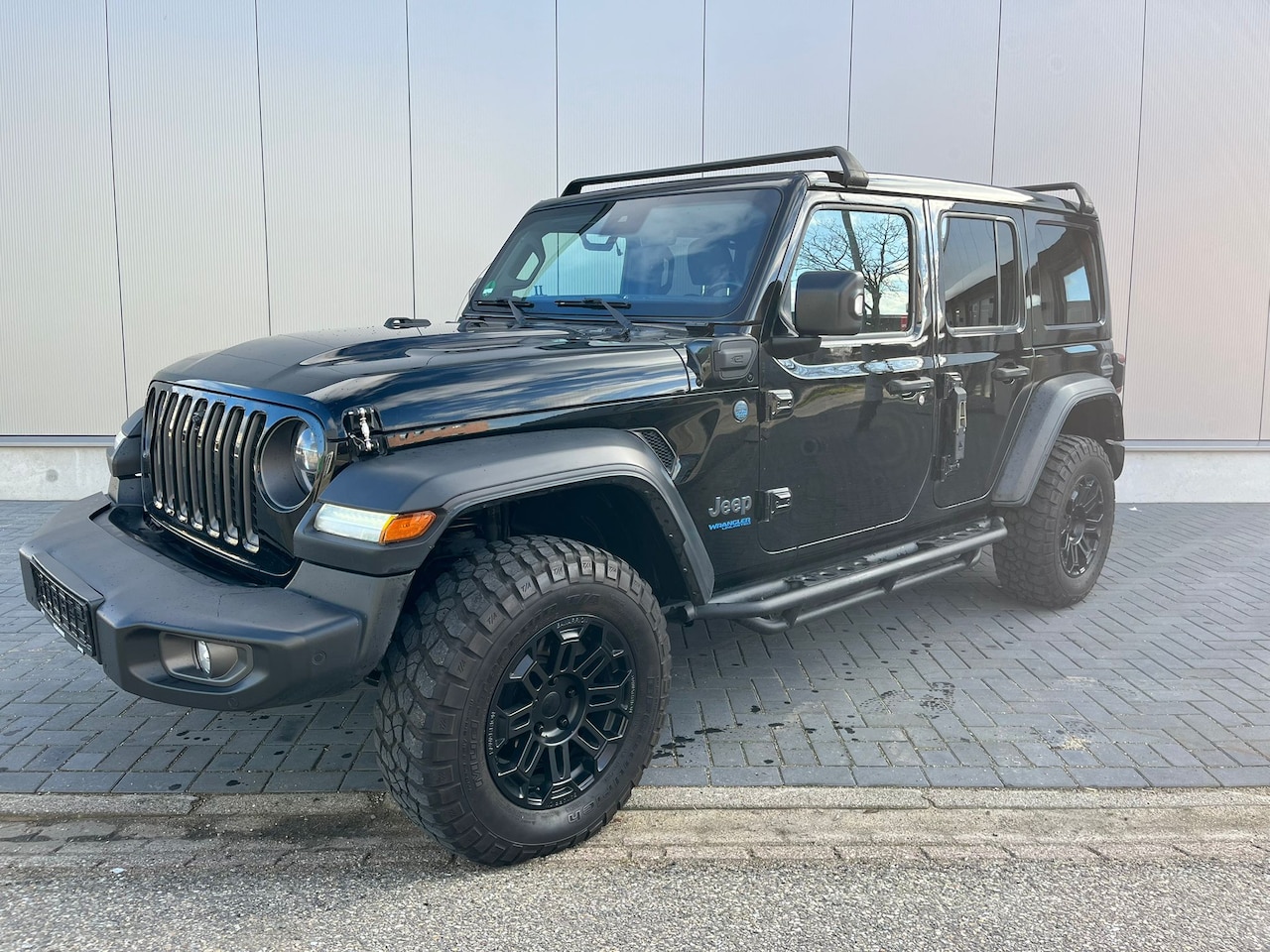 Jeep Wrangler Unlimited - 4xe 380 Rubicon Leder, cabriodak - AutoWereld.nl