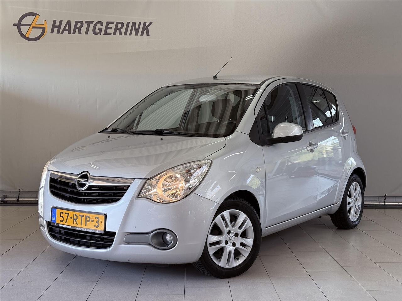 Opel Agila - 1.2 16V 94pk Automaat Edition* Radio / Airco / Elektr.ramen en spiegels / LMV - AutoWereld.nl