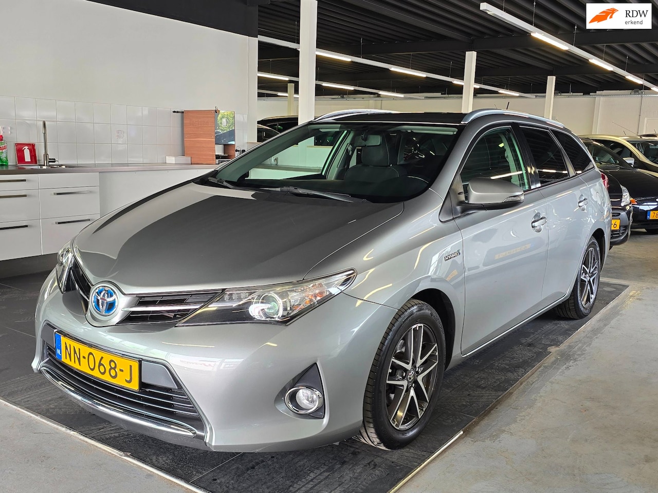 Toyota Auris Touring Sports - 1.8 Hybrid Aspiration/NAVI/CRUISE/ - AutoWereld.nl