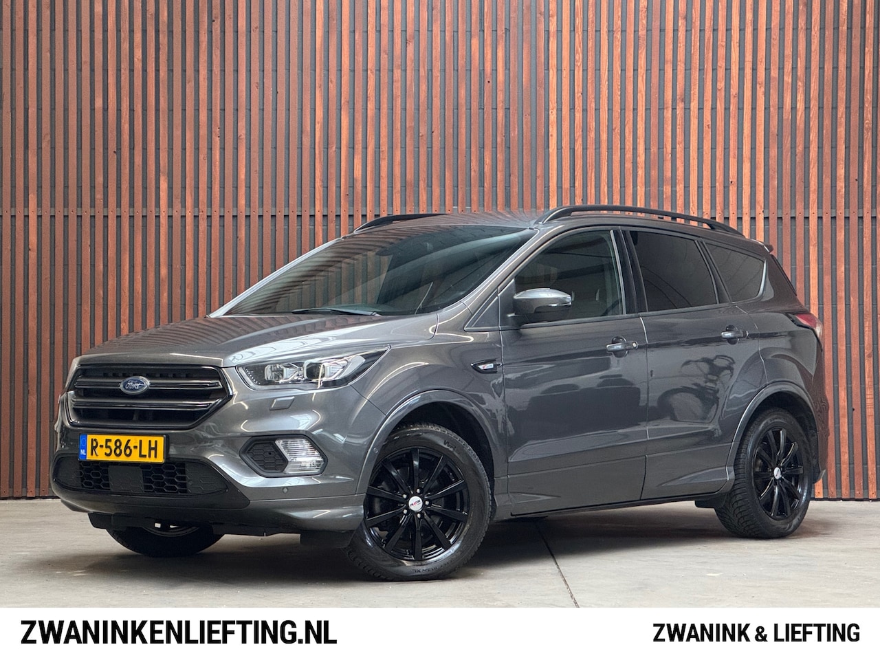 Ford Kuga - 1.5 EcoBoost ST Line NAVI-PDC-CRUISE-CLIMA-WINTERPAKKET - AutoWereld.nl