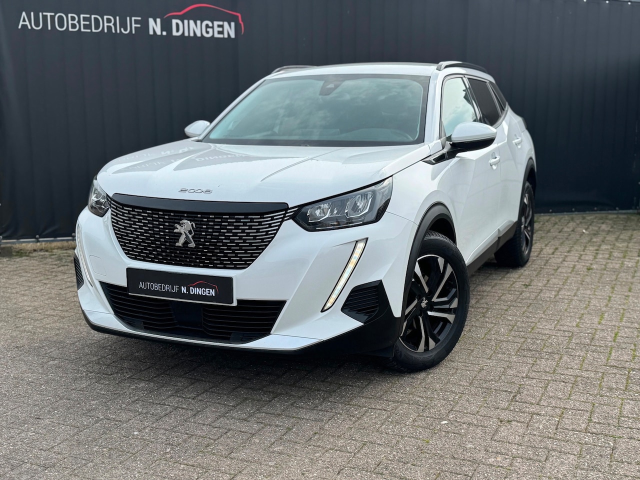 Peugeot 2008 - 1.2 PureTech Allure Pack stoelverwarming camera navigatie - AutoWereld.nl