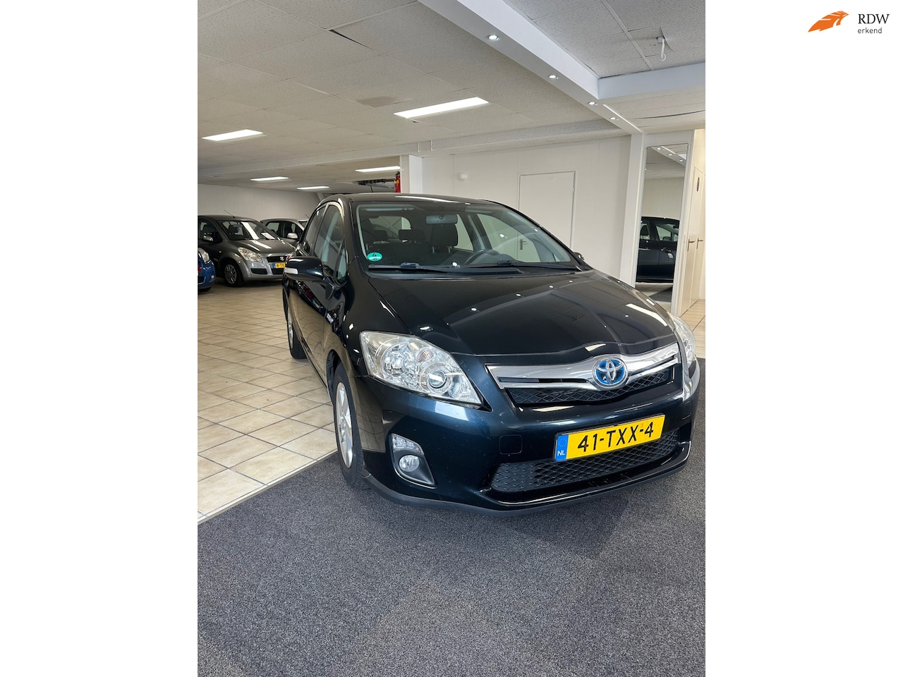 Toyota Auris - 1.8 Full Hybrid Business.eerste eigenaar, NAP KM - AutoWereld.nl