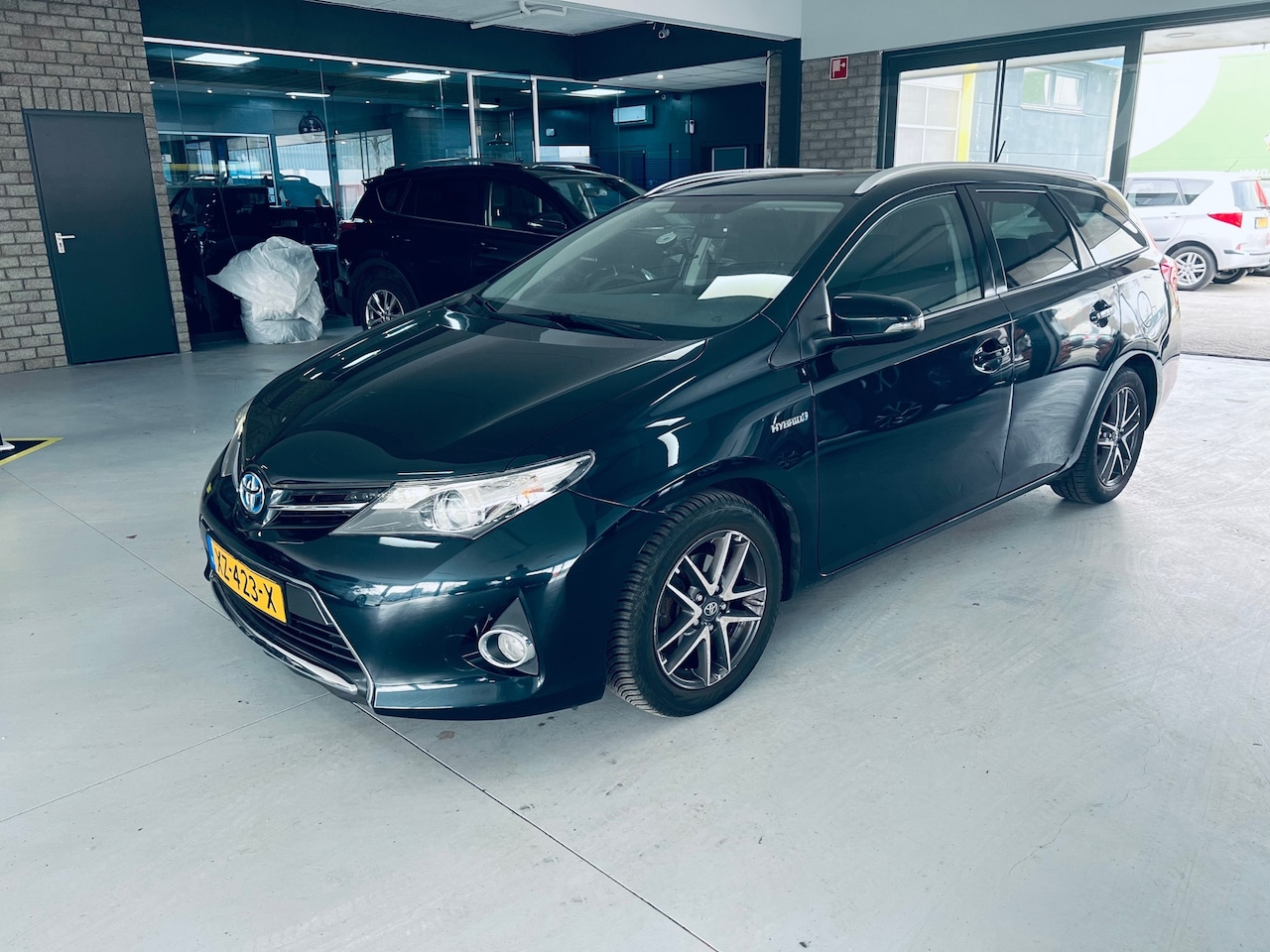 Toyota Auris Touring Sports - 1.8 Hybrid Lease Top 5 editie eerste eigenaar - AutoWereld.nl