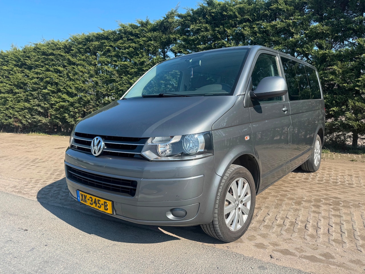 Volkswagen Transporter Caravelle - 2.0 TDI L1H1 Highline - AutoWereld.nl