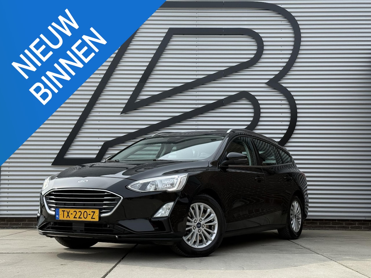 Ford Focus Wagon - 1.0 EcoBoost Titanium Business Navi|Cruise|Trekhaak|Stoel+Stuur verw|Carplay|B&O|PDC V+A|N - AutoWereld.nl