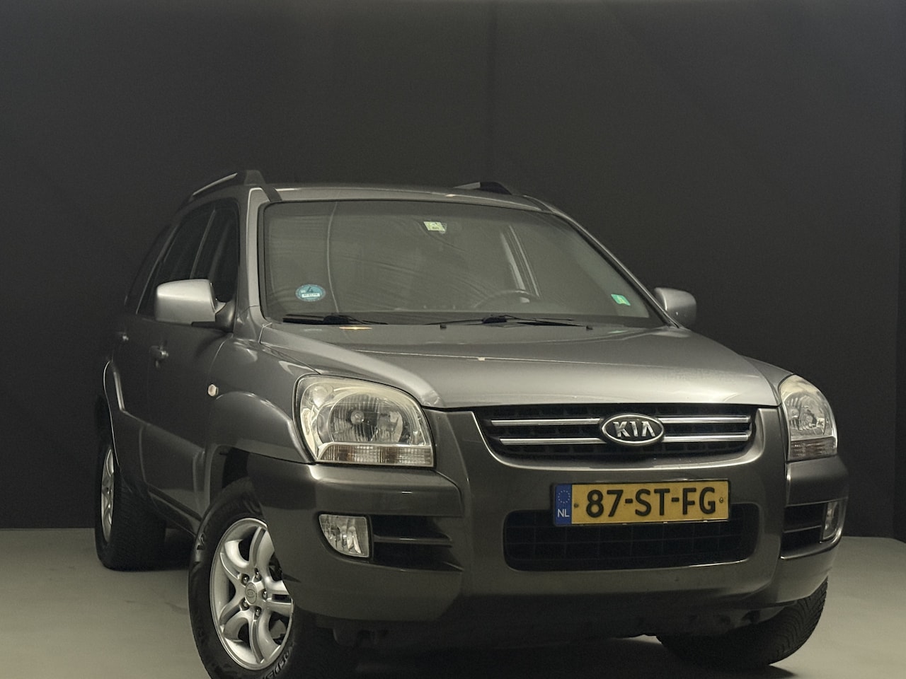 Kia Sportage - 2.0 CVVT Comfort 2.0 CVVT Comfort - AutoWereld.nl