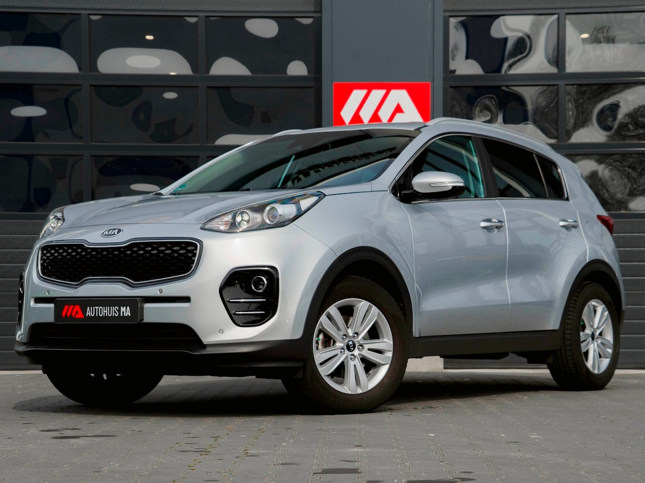 Kia Sportage - 1.6 GDI ComfortLine Navigator JBL|Stoelverwarming|Trekhaak|Camera|Navi|Leder|Cruise - AutoWereld.nl