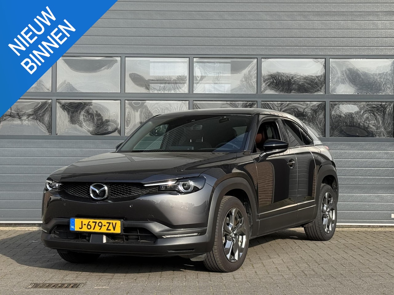 Mazda MX-30 - E-SKYACTIV 145 FIRST EDITION 36 kWh I 94% SOH I P-CAMERA I APPLE CARPLAY I ADAPTIVE CRUISE - AutoWereld.nl