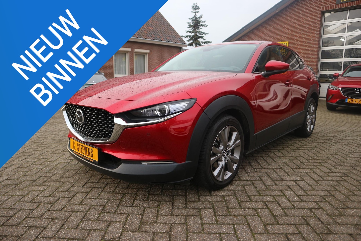 Mazda CX-30 - 2.0 e-SkyActiv-G M Hybrid Comfort Navigatie , Carplay - AutoWereld.nl