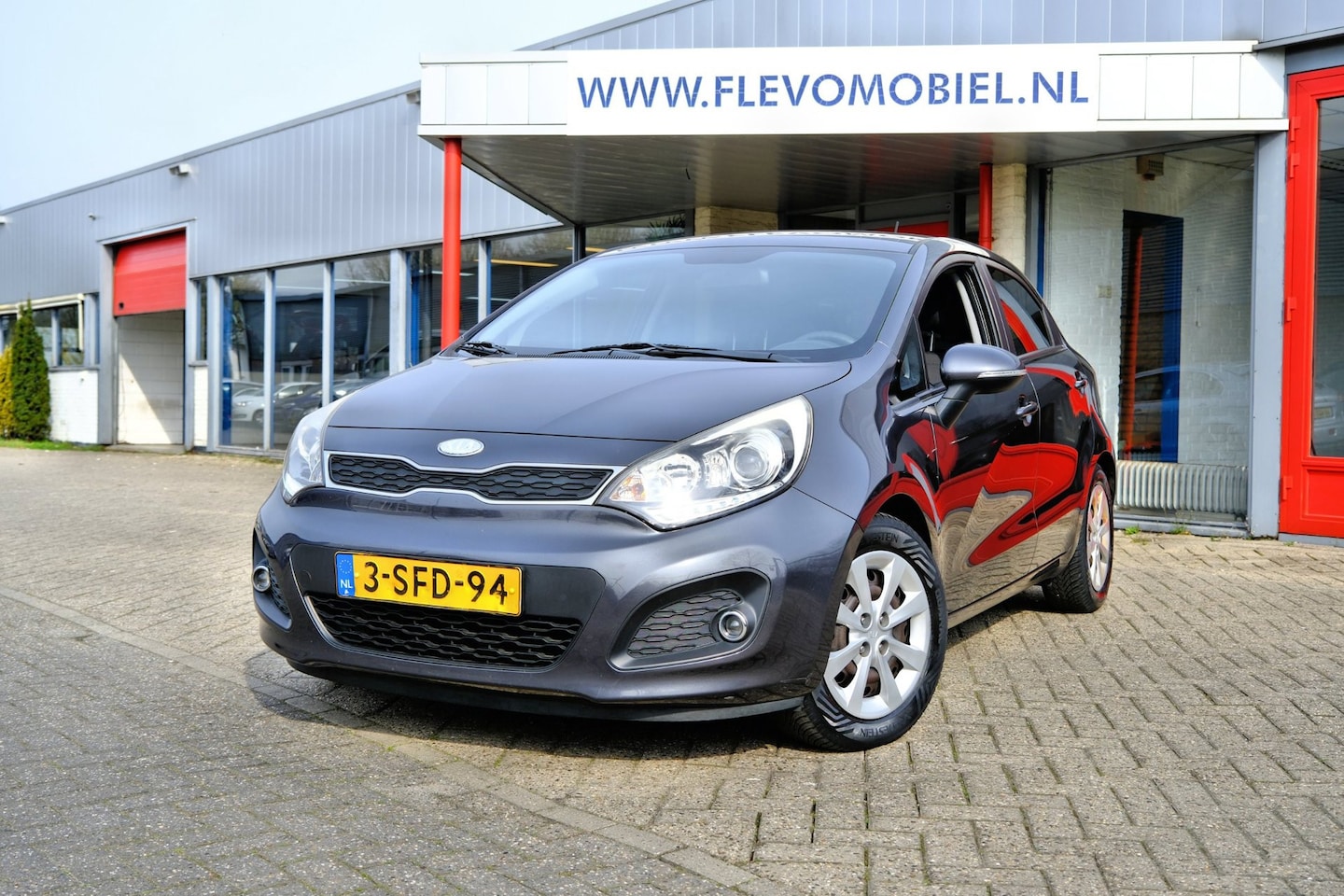 Kia Rio - 1.2 CVVT Plus Pack 5-drs Airco|Navi - AutoWereld.nl