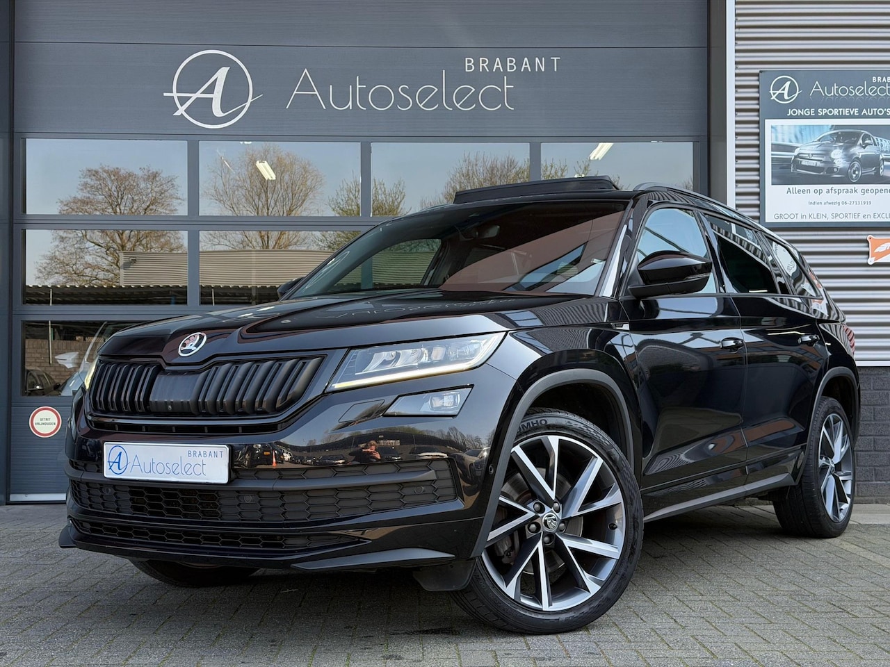 Skoda Kodiaq - 2.0 TSI 4x4 Sportline Pano 360 Memory - AutoWereld.nl