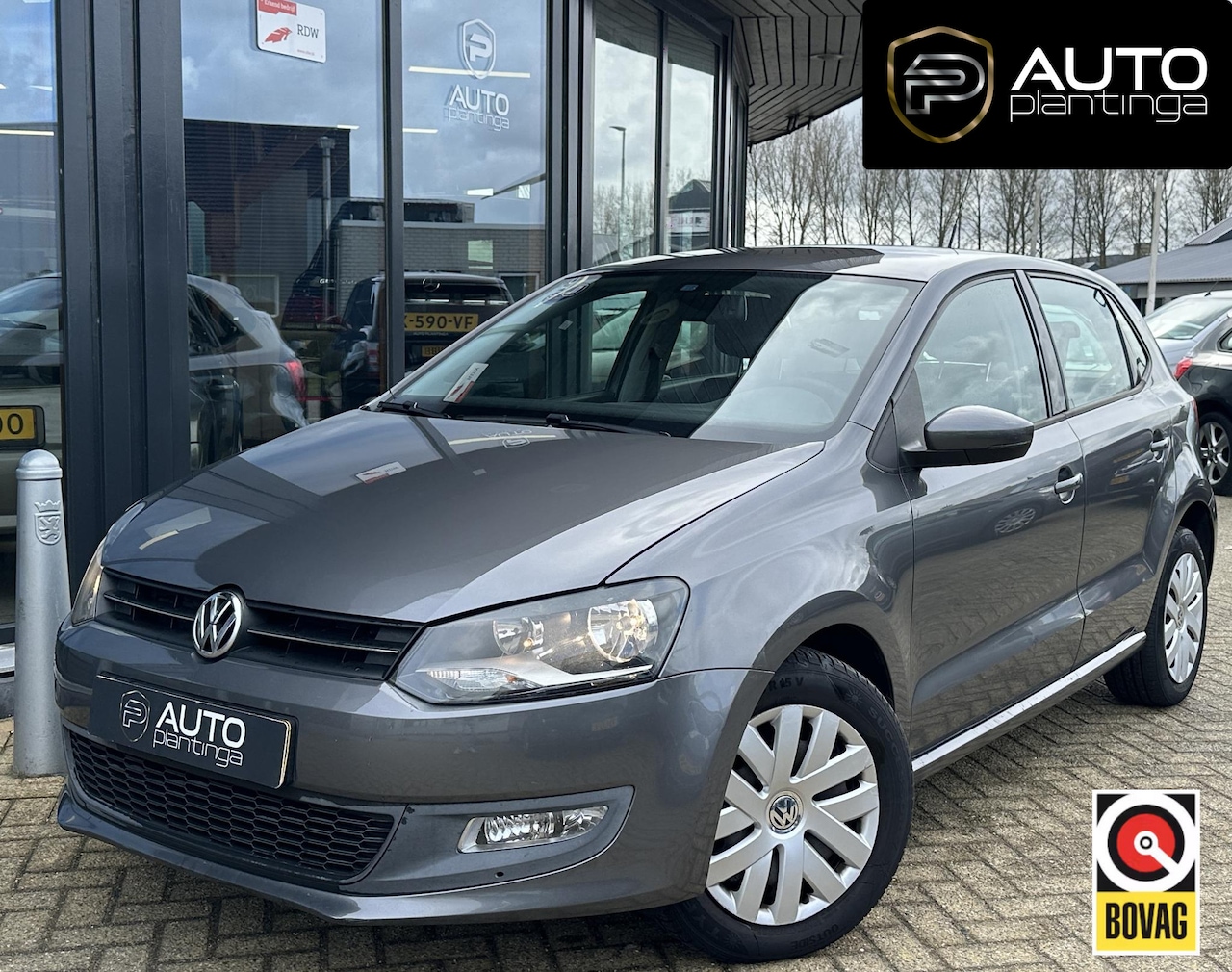 Volkswagen Polo - 1.4-16V Comfortline 86PK | NL Auto | Airco | Cruise Control | Armsteun | 5 Deurs | 2 Sleut - AutoWereld.nl