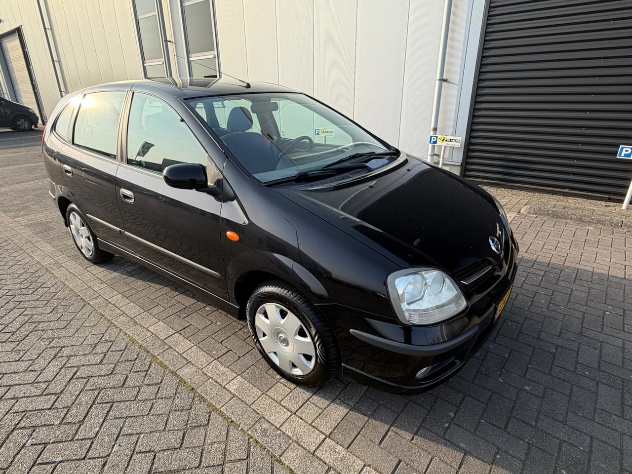 Nissan Almera Tino - 1.8 Visia Airco achterhout camera - AutoWereld.nl