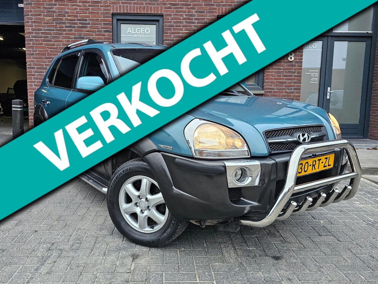 Hyundai Tucson - 2.7i V6 4WD Automaat / Leder / Trekhaak - AutoWereld.nl