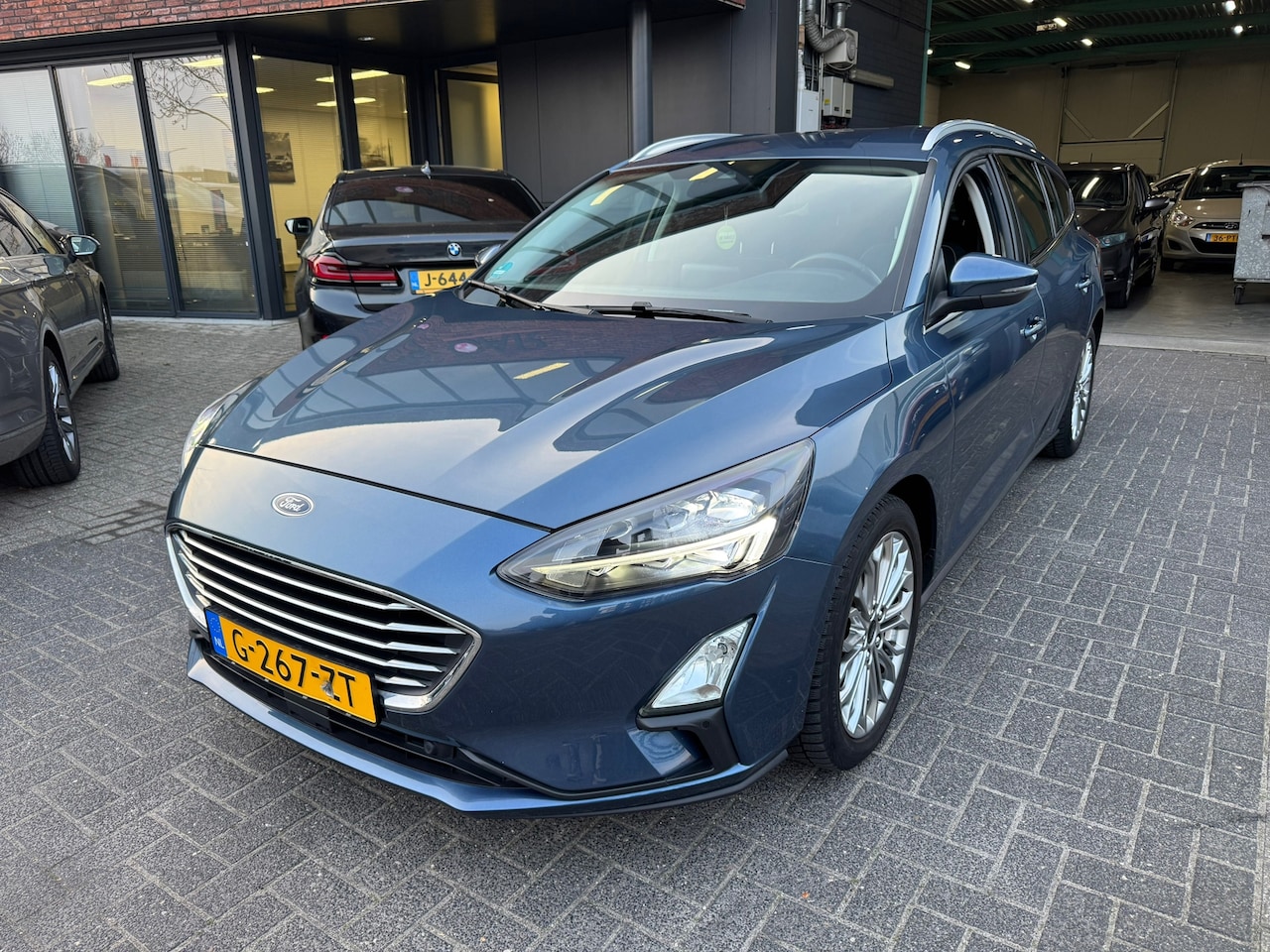 Ford Focus Wagon - 1.0 EcoBoost Titanium LED PDC CRUISE DEALER OH ORIG NL NAP - AutoWereld.nl