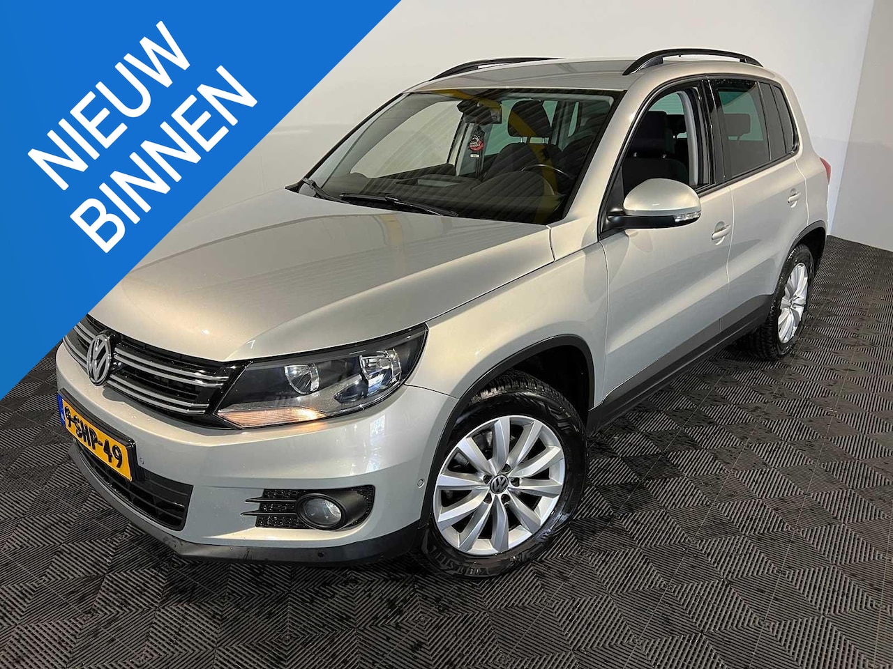 Volkswagen Tiguan - 1.4 TSI Comfort&Design Edition - AutoWereld.nl