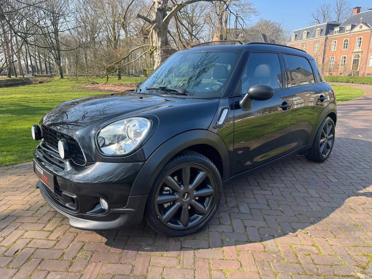 MINI Countryman - 1.6 Cooper S ALL4 Chili Mini Countryman 1.6 Cooper S All4 Chili Shadowline Luxe Pakket AUTO PANO JCW 2011 Zwart - AutoWereld.nl