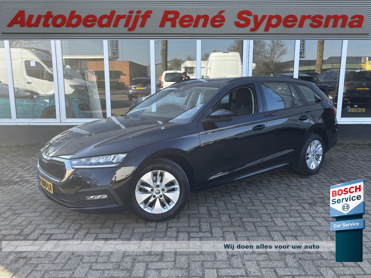 Skoda Octavia Combi - 1.0 e-TSI Business Edition | Sfeerverlichting | Parkeersensoren | Apple Carplay | Lane Ass - AutoWereld.nl