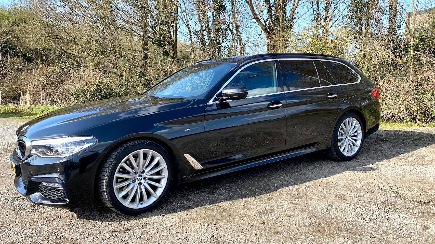 BMW 5-serie Touring - 520i High Executive M Sport - AutoWereld.nl