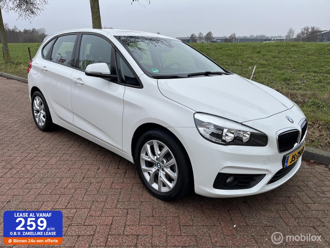 BMW 2-serie Active Tourer - 220i Sport Automaat + Trekhaak - AutoWereld.nl