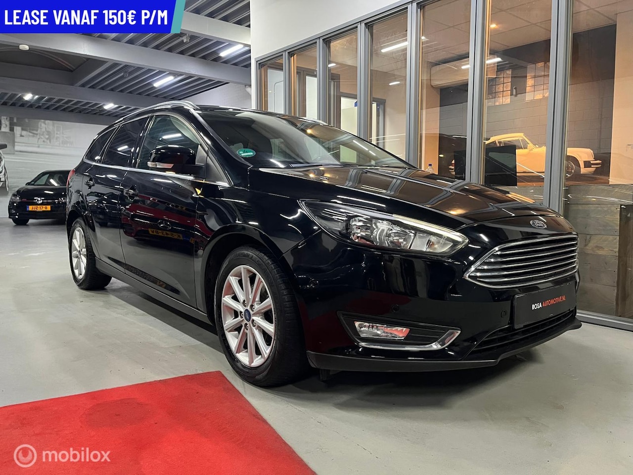 Ford Focus Wagon - 1.0 Titanium NAVI LEER ELEK STOEL.PDC CRUISE VEEL OPTIES STOELVERW. - AutoWereld.nl
