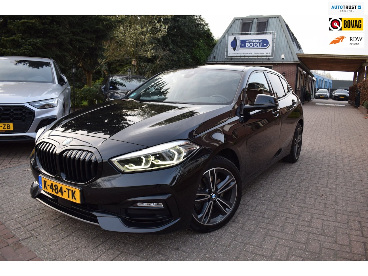 BMW 1-serie - 118i High Executive Edition AUTOM/NAVI/CRUISE/CARPLAY/AIRCO/XENON/NL-AUTO/BLUETOOTH//PDC V - AutoWereld.nl