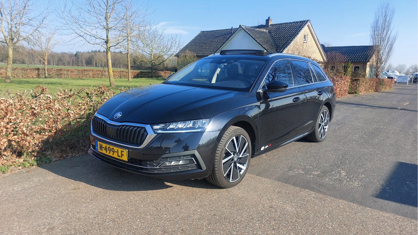 Skoda Octavia Combi - 1.4 TSI iV PHEV Business Edition CLIMA/NAVI/PANO/LED BJ 2021 - AutoWereld.nl