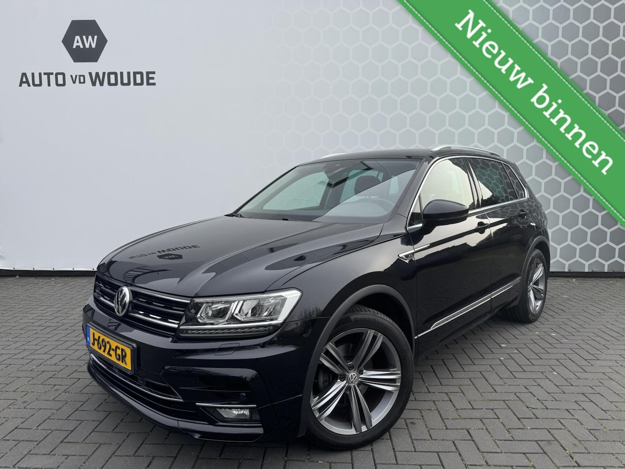 Volkswagen Tiguan - 1.5 TSI ACT Highline R-line 360 Camera DSG - AutoWereld.nl