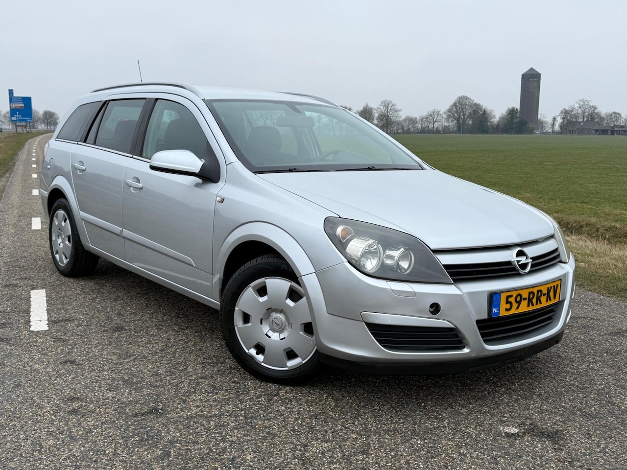 Opel Astra Wagon - 1.6 Enjoy 105pk | Airco | Trekh - AutoWereld.nl