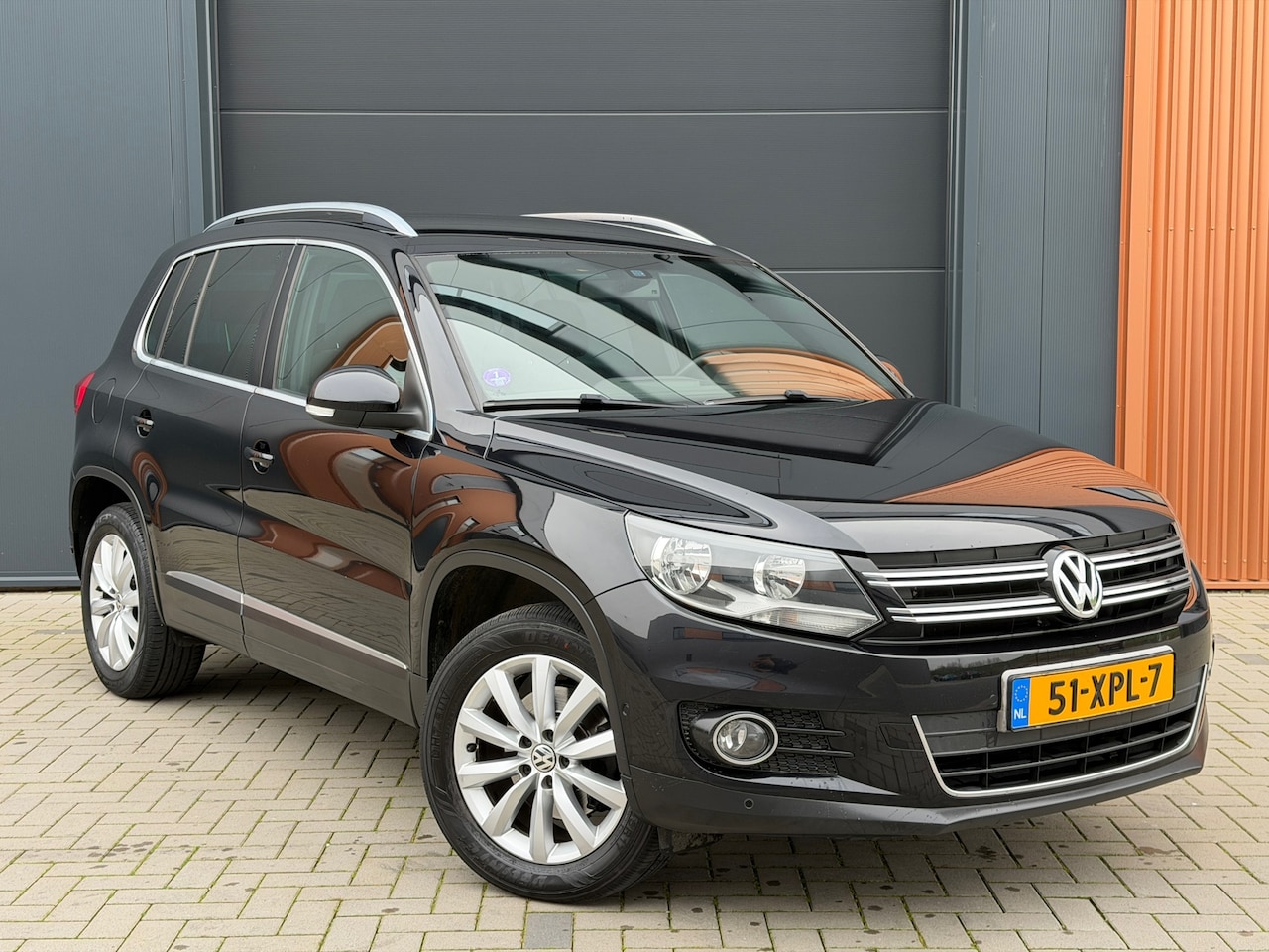 Volkswagen Tiguan - 1.4 TSI Sport&Style|100% onderhouden|Trekhaak|Camera|Climate Control|Cruise Control - AutoWereld.nl