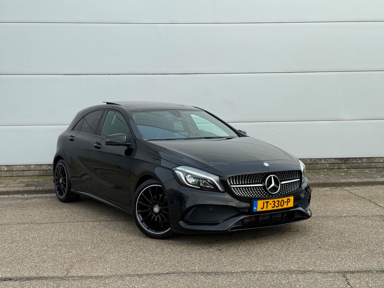 Mercedes-Benz A-klasse - A180 AMG-PAKKET (bj 2016) PANODAK|XENON|PDC|NAVI|18” - AutoWereld.nl