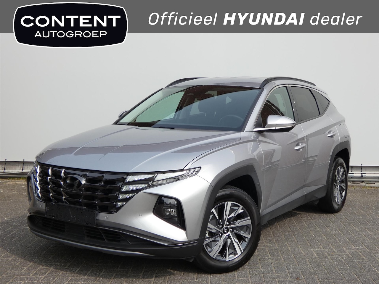 Hyundai Tucson - 1.6 T-GDi HEV Aut. Comfort | Navi | Cruise | Airco - AutoWereld.nl