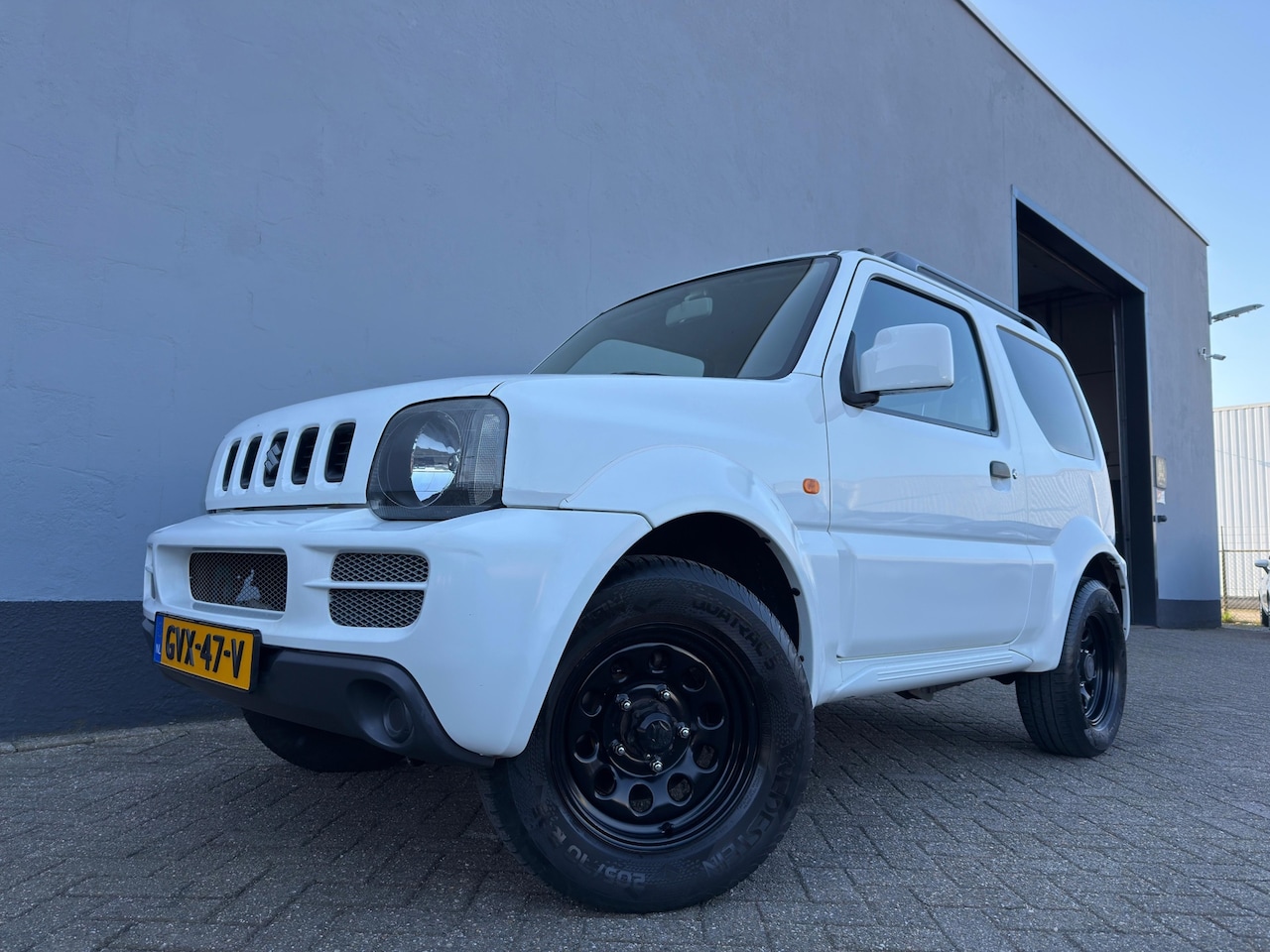 Suzuki Jimny - 1.3 JLX Automaat - Carplay - Trekhaak - AutoWereld.nl