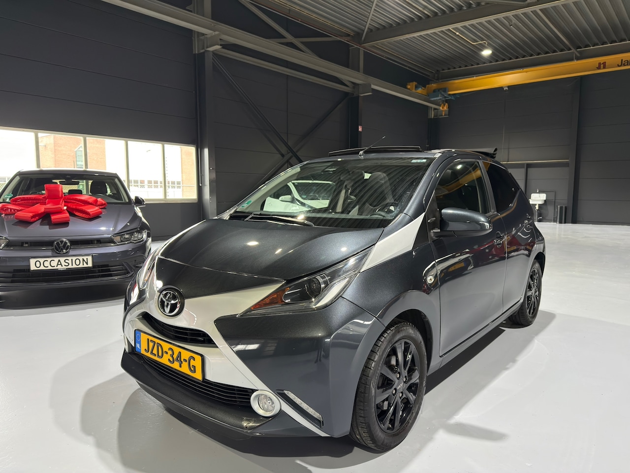 Toyota Aygo - 1.0 VVT-i x-cite Vouwdak |Camera |Lane assist | Keyless - AutoWereld.nl