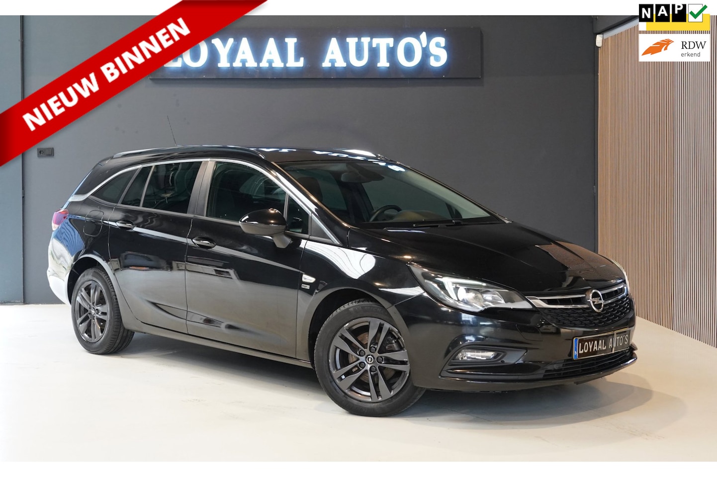 Opel Astra Sports Tourer - 1.0 Turbo 120 Jaar Edition | NAVI | CRUISE | AIRCO | PDC | NAP | NAP. - AutoWereld.nl