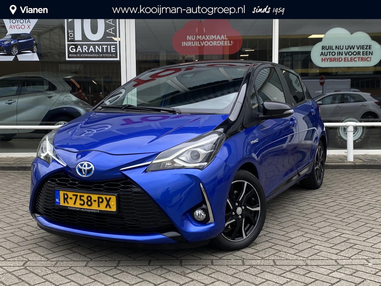 Toyota Yaris - 1.5 Hybrid Bi-Tone Navi, Climate & Cruise control. Hoge instap zeer nette auto. - AutoWereld.nl