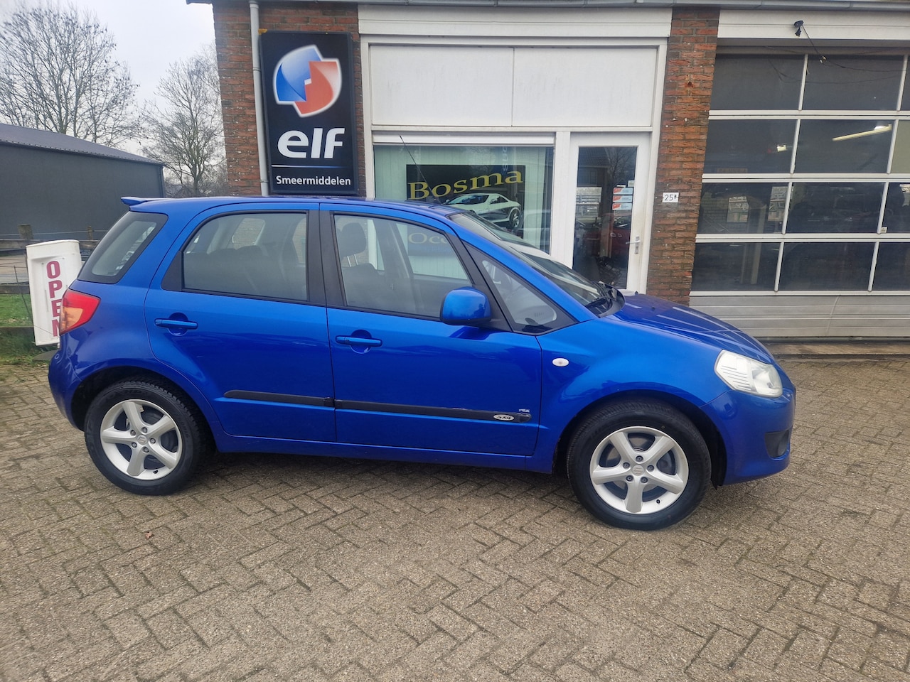Suzuki SX4 - 1.6i "Exclusive" Airco - Trekhaak -Lm velgen - Apk 13-03-2027 !! - AutoWereld.nl