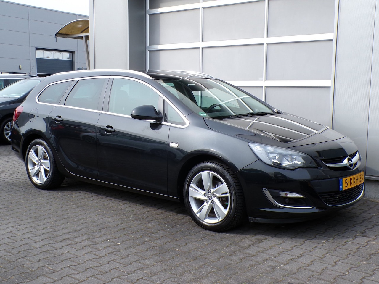 Opel Astra Sports Tourer - 1.4 Turbo Sport|Leder|Cruise|Trekh. - AutoWereld.nl