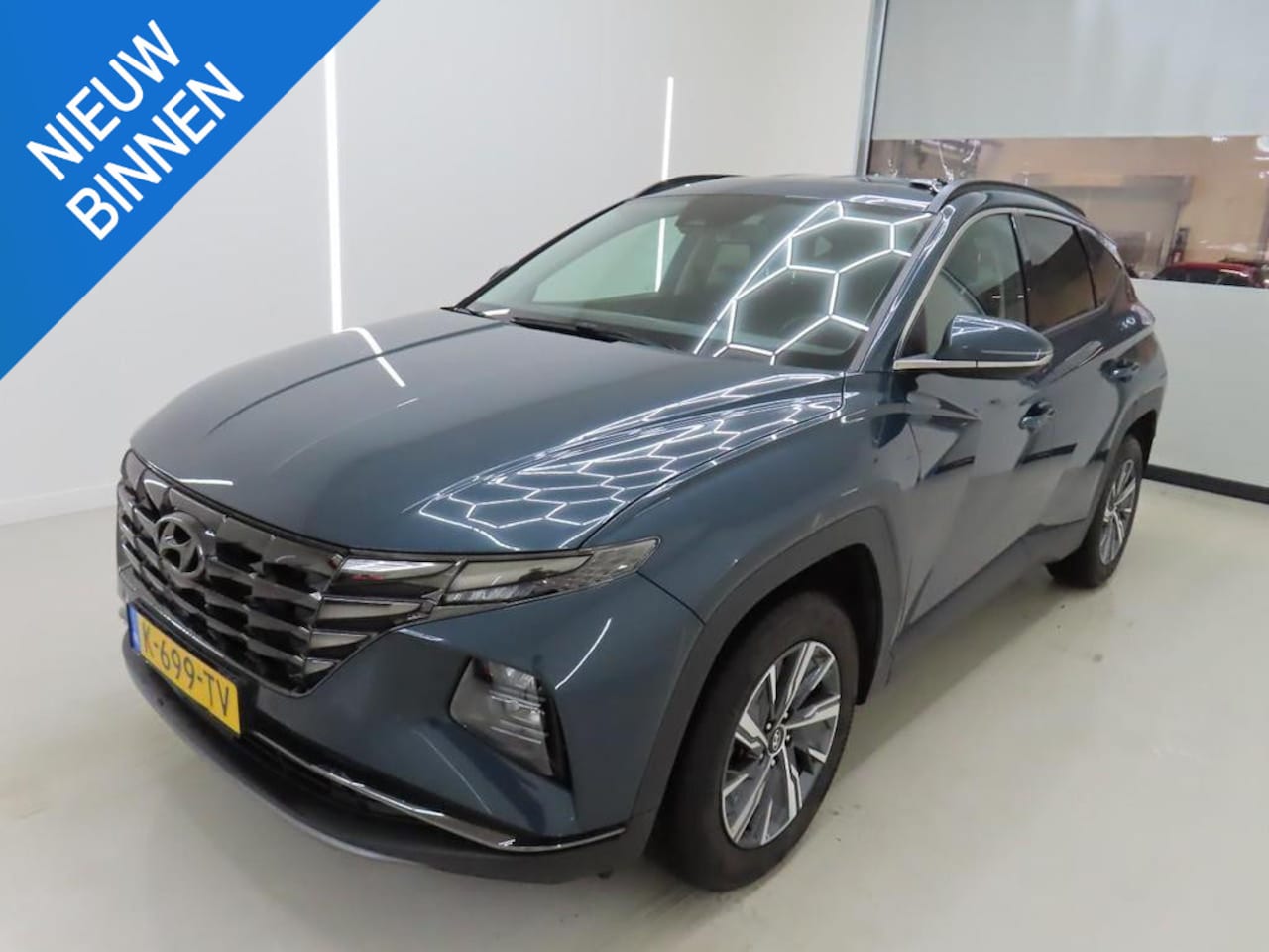 Hyundai Tucson - 1.6 T-GDI HEV COMFORT I AUTOMAAT I TREKHAAK I APPLE CARPLAY I P-CAMERA I ADAPTIVE CRUISE C - AutoWereld.nl