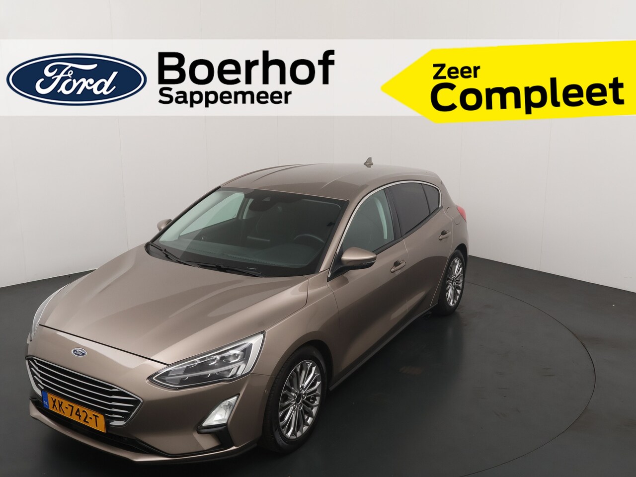 Ford Focus - 125pk EcoBoost Titanium | Trekhaak | Winterpack | Adap. cruise | LED | Camera | 100% Deale - AutoWereld.nl