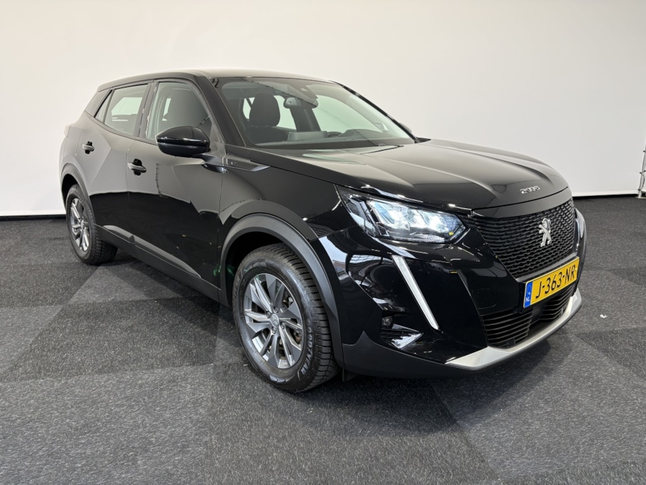 Peugeot e-2008 - 50 kWh SOH 87% Carplay Airco Cruise Control 3fase - AutoWereld.nl